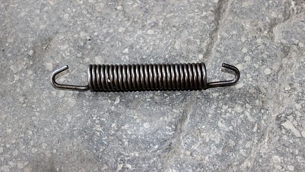 Пружина оттяжная колодок Т-150К 151.38.104-А